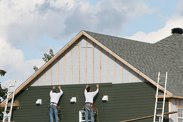 Professional Emergency Siding Repair technician working in Malden, MA